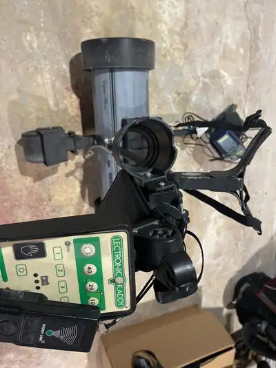 Lectronic golf kaddy. Has newer battery with charger and remote. Older model in good condition. Best...