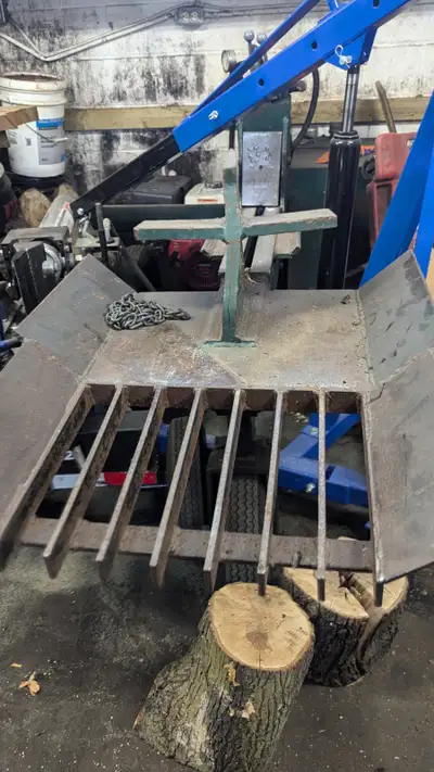 high production wood splitter that can split 4 face cords an hr . honda engine has 200 hrs on it and...