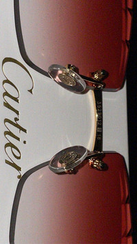 Cartier black buffalo horn red diamond cut lens (SEND OFFERS)