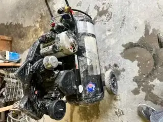 Used 20 Gallon Sanborn Air compressor