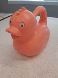 Pink duck watering can