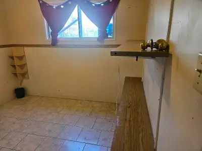 First month discount! This is a freshly painted bedroom in a house, featuring tiled floors, storage,...