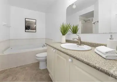 Looking for a female roommate to rent a furnished second bedroom in a 3-bedroom, 2.5-bath townhouse...