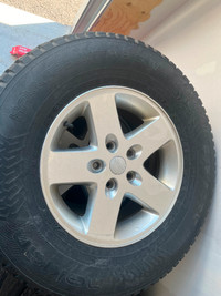Jeep wrangles wheels with winter tires 17” (x 4)