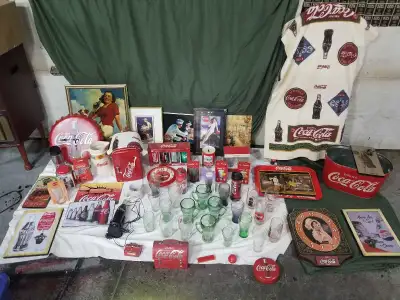 Selling a good start-up collection of coca-cola items, approx 40 misc glasses some still boxed new,a...