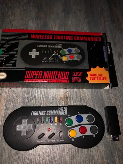 This Hori Fighting Commander wireless controller for the Super Nintendo Classic Edition is in good c...