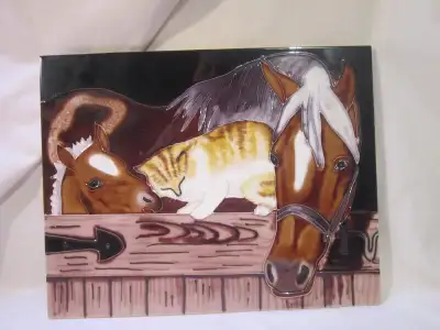 This larger tile can be hung on the wall or it can stand up like a picture frame. It measures 14 x 1...