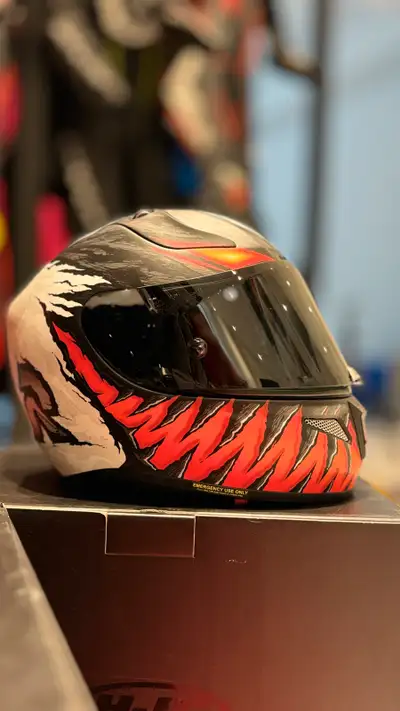 Brand new. In the box. Plus 2 visors. Xs or small. Have pads both sizes.
