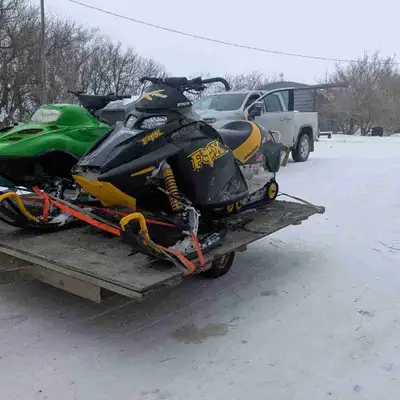 I got a 2003 Ski-Doo rev 800, it just got a new track put on it, runs and drives good, has a afterma...