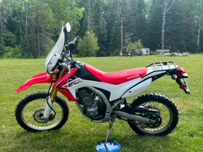 Stock crf250l. Street legal, stock other than windshield. Cheap to insure Bike is in Dryden