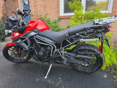 Very low kilometer, top- trimmed adv motorcycle. Comes with side luggage and lots of features. Heate...