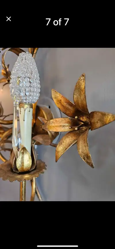Add a touch of vintage elegance to your home with this stunning Hans Kogl-style gold floral chandeli...