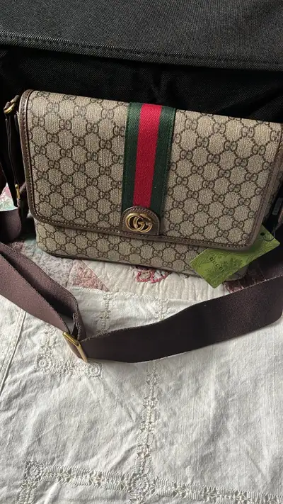 Gucci messenger bag, View more