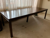 Large dining room table with chairs