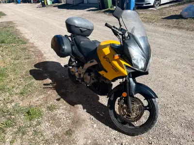 Excellent touring bike. Everything works. Comes with the luggage and heated grips.