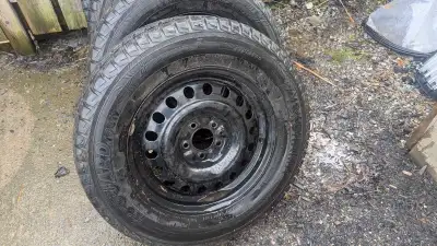 Set of 4 17" steel rims and tires winters 245/65R17 Yokohama guard 95 % treads on tires rims we thin...