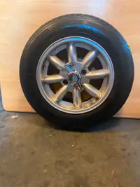 4 Minilite style wheels and Vredestein tires for sale.