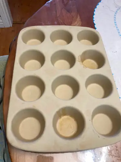Pampered Chef clay muffin pan, View more