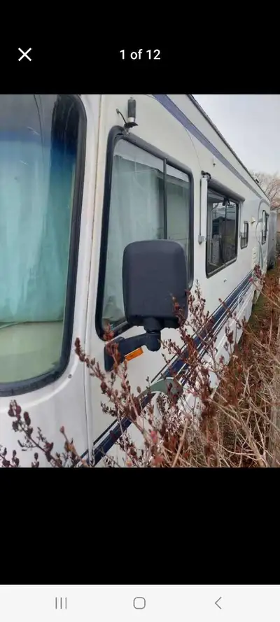 32 feet, V8 engine, 3 new batteries, Must see Upgraded hardwood floor and new queen bed. Comes with...