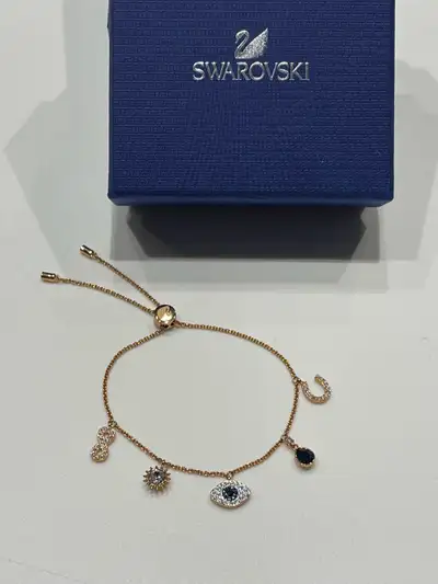 Swarovski Infinity, Evil Eye and Horseshoe Charm Bracelet, View more