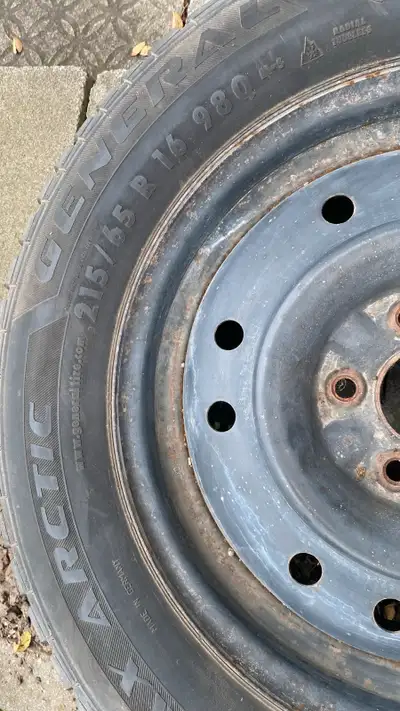 Winter tires with rim of Sienna 2006 for sale $100 One of them hit a nail Pickup and cash only