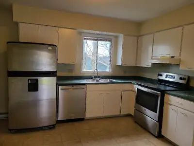 Bright and attractive upper level apartment in family friendly area. Large yard and balcony off of d...