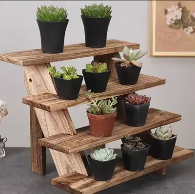 Wooden 4-Tier Display Stand Brand new never used Beautiful natural wooden stand with 4 shelves. Size...