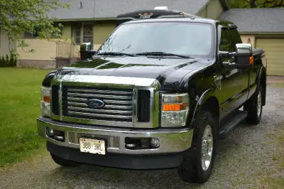 2009 Ford F350 4X4 SRW Black exterior, black leather interior 6.4L diesel 5 speed automatic - Electr...