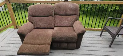 I have a used recling love seat in good condition with the right being a little worn in the under ca...