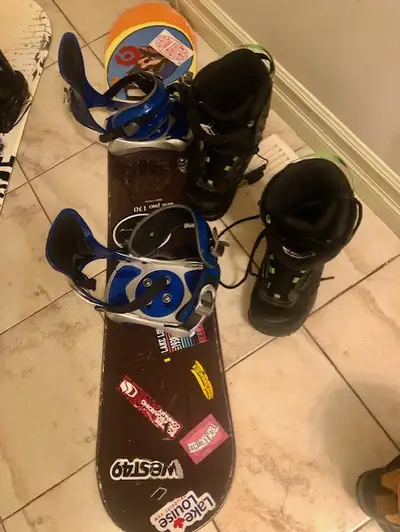 Snowboard with bindings and shoes. Snowboard size 50.5" and the shoes size is US MEN 5.5 great condi...
