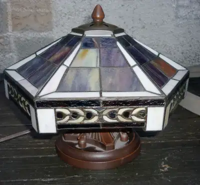 Absolutely beautiful Tiffany style lamp, cast metal base with a bronze finish, very Art Deco. Real s...