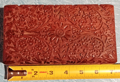 Beautiful unique small hand carved, Walnut jewlery box with felt lining Solid all around, no chips o...