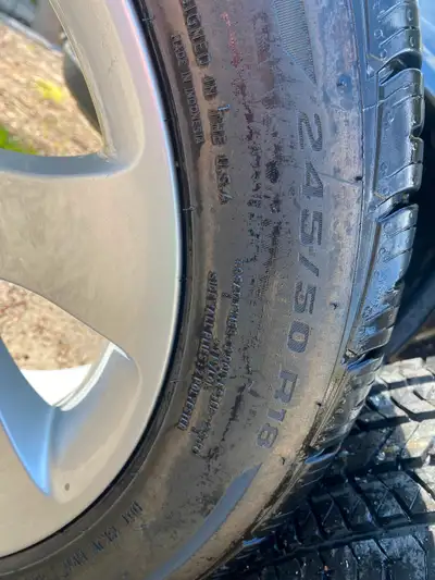 BMW 18 inch OEM factory wheels basically new used not even four months tires are in excellent condit...