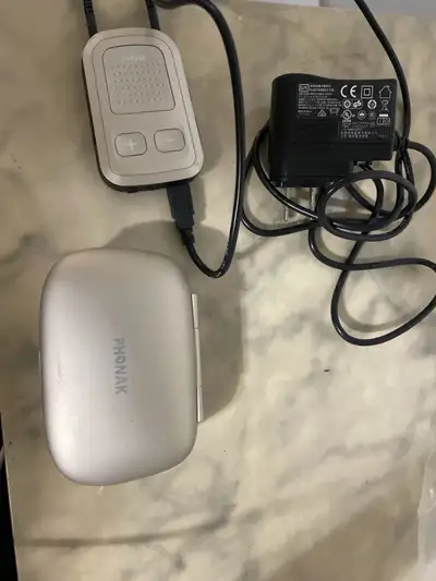 Phonak hearing aids and a Phonak ComPilot II