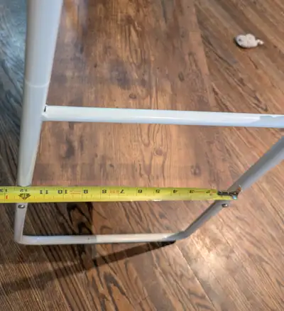 this is in like new condition. made of metal supports and wood shelves. measurements in the pictures...