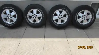 We have 4 Michelin Defender LTX M/S tires for sale on Ford rims, size 235/70/R16. The wheels were on...