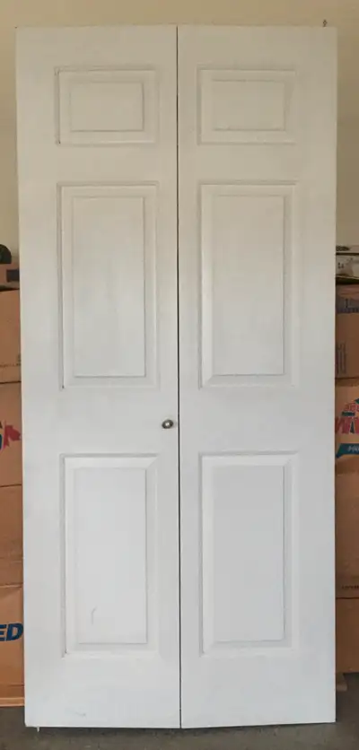 Never use, textured Interior Bi-fold Door, White 36-inch x 80-inch 6 Panel, 70$ , Contact @ 60478062...