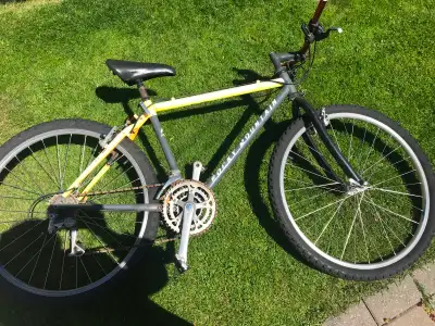 Rocky Mountain black and yellow bike $300, View more