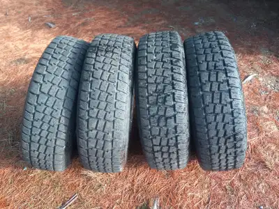 Perfectly useable 235 75 15" tires, two do have some cracking from age, removed from vehicle all hel...