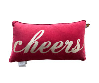 Pillow, decorative, red with printed writing "cheers" on it