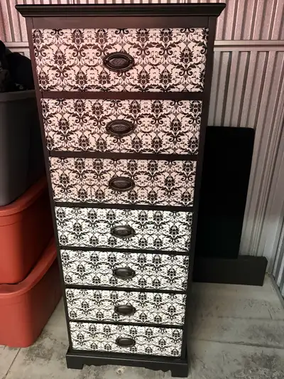 Wooden 7-drawer dresser with ornate pattern, View more