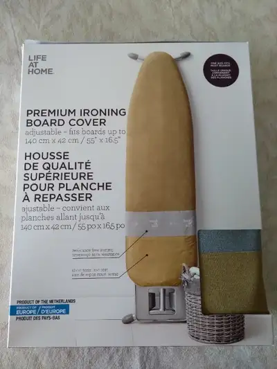Brand new ironing board cover/pad with adjustable cords, will fit ironing boards up to 55 inches lon...