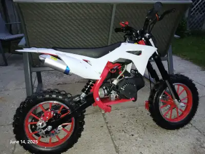Mint little dirt bike just was assembled by expert. 330 pound max rider weight capacity. $650 locate...