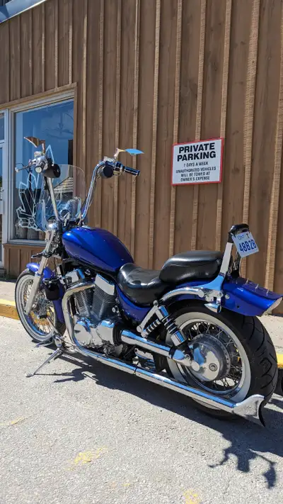 Selling my 1996 Suzuki Intruder VS1400. This bike turns heads — candy blue paint, whitewall tires, c...