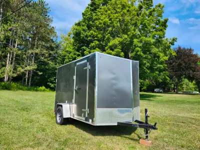 2024 Haulin Enclosed trailer very little use has Motorcycle stand also built in , trailer like new c...