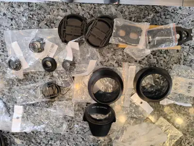 Camera strap, eye cap, lens cap,hood 86,77,52 mm. bracket, View more