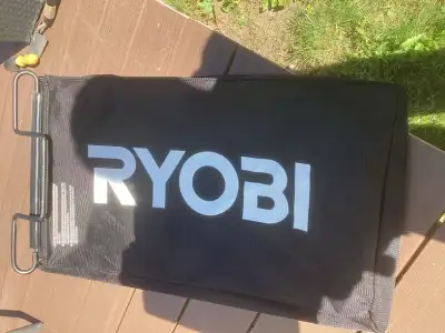 Ryobi rear bagger for Ryobi electric lawn mower.  Like new, View more