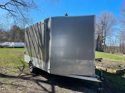 The trailer is 102” wide 12 ft long and 15 ft to the nose. Custom built, used twice, new condition