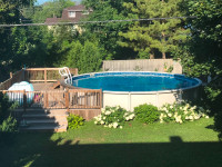 Above ground pool and deck for sale