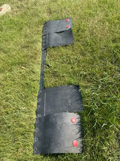 Mudflaps that attach to hitch. $50.00, call or text 780-871-3373